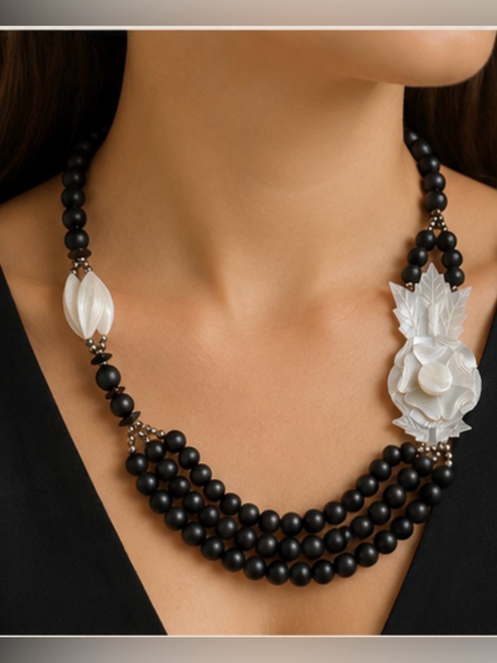 Handcrafted Black Beaded Necklace with Mother-of-Pearl Floral Pendant
